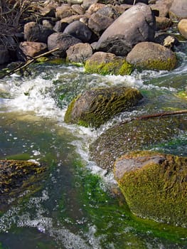 stone in river flow