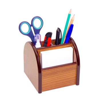 Office wooden stand for pens and pencils on a white background