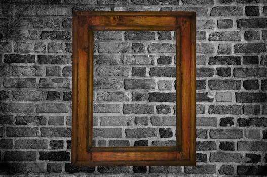 old wooden frame on brick wall.