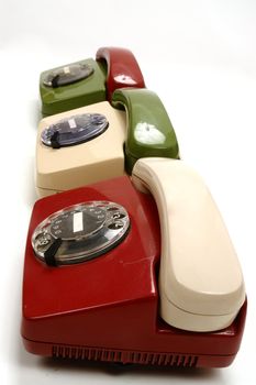 colourful retro phones symbolizing conference/teamwork/network............