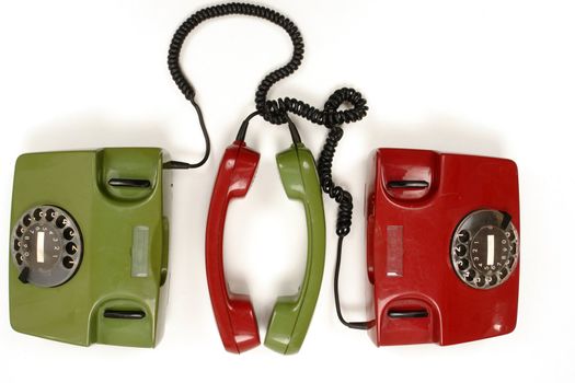 colourful retro phones symbolizing conference/teamwork/network............