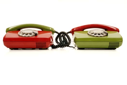 colourful retro phones symbolizing conference/teamwork/network............