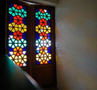 Stained-glass window with multi-coloured glass                       