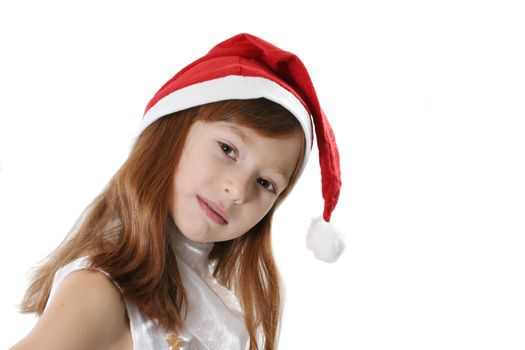 Portrait of the girl in a red cap close up on a white background