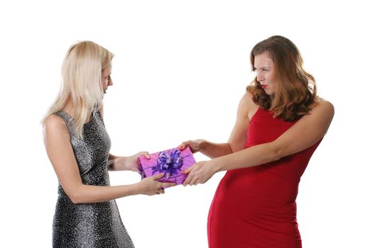 Girls pull out a gift each other on a white background