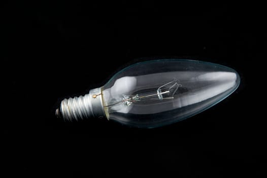 Electric lamp on a black background