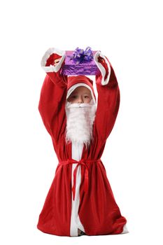 The boy in a suit Santa with a gift in hands on a white background