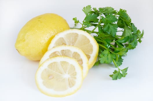 the fresh cut lemon against the white background