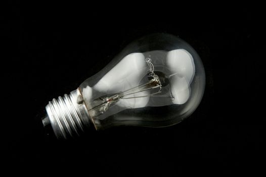 Electric lamp on a black background