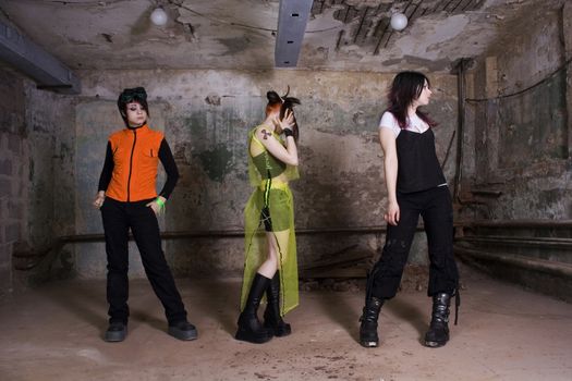  Girls of goth in a gloomy, dirty, terrible cellar