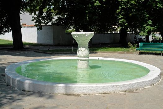 Small fountain with thin jets of water