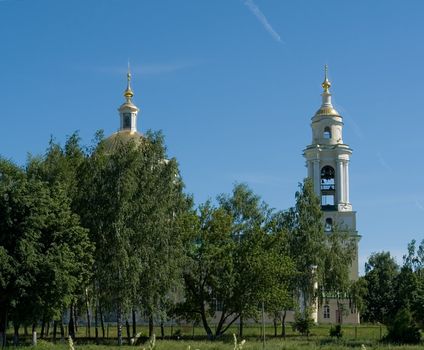 Domes of orthodox temple with blue sky at background