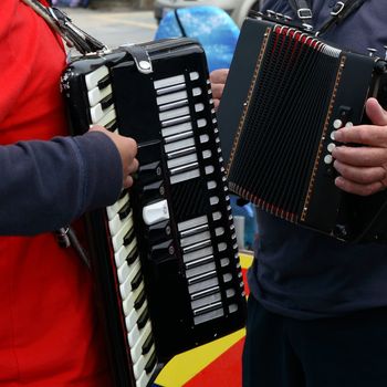 man and woman playing traditional music in ballybunion ireland