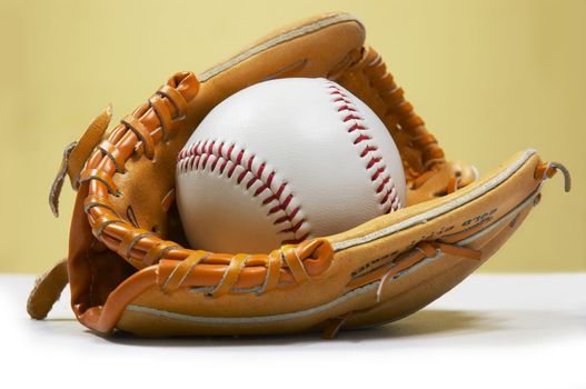 baseball ball in kids/junior sized glove