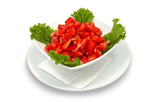 tomato salad with lettuce served on plate