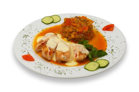 grilled stuffed chicken fillet under white sauce with stewed vegetable garnish, isolated