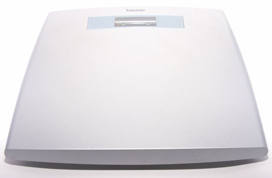 Weighing scales on white background.