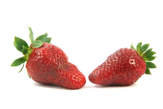 two big strawberries isolated on white background fruits and vegetables