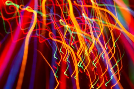 abstract background: colored light motion blurs