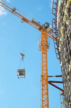 working building crane with new office block