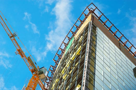 working building crane with new office block