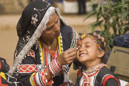 Young Rajasthani dancer gets ready to perform at the Sarujkund Fair near Delhi in India.







SONY DSC