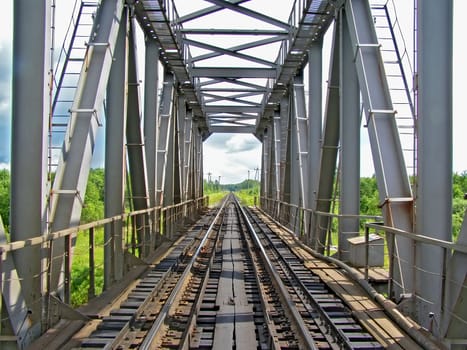 railway bridge through small river