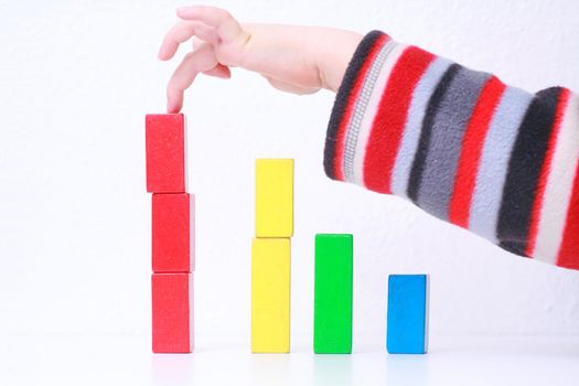 sales charts symbolized by wood toys............