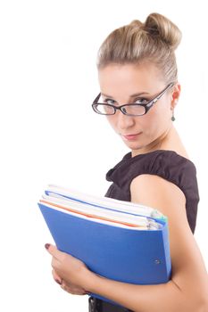 Rigorous woman in glasses with papers over white