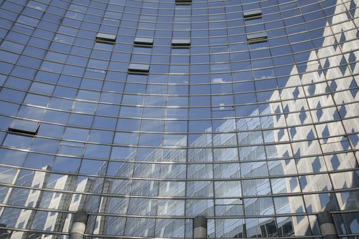 Corporate glass building with open windows - La Defense, Paris