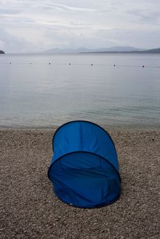 Tent for one person an early summer morning by the Adriatic Sea - Croatia.