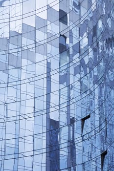 Abstract corporate facade with reflections - La Defense, Paris - France.