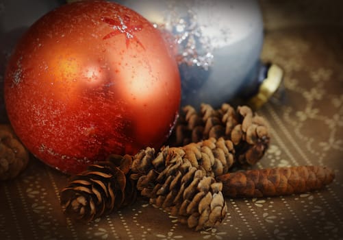 grunge; grungy; vintage; old; christmas; ornament; ball; pine; cone; wallpaper; tapestry; brown; orange; blue; antique; holiday; vertical; merry; occasion; celebration; celebrate; card; background; dark; classic; tradition; xmas; decoration; glass; 