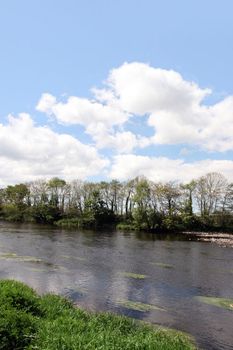 the Feale river that runs through Listowel county Kerry in Ireland on a summers day