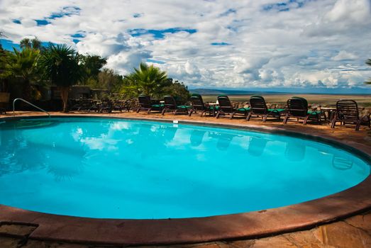 Pool with a great view of Masai Mara great plane, Kenya
