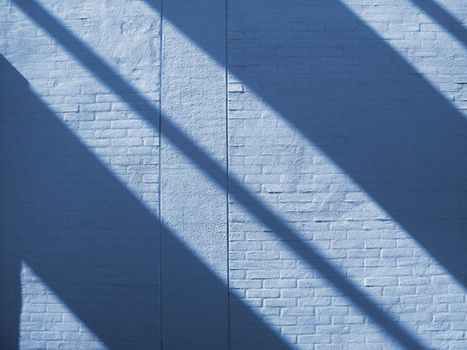 Abstract shadow of a staircase on modern painted brick wall - Sweden.