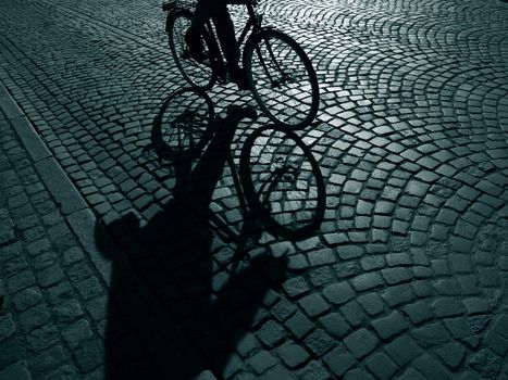 Dark urban cyclist  on his way home after work - Denmark.