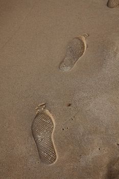 Human trace of a foot on sand