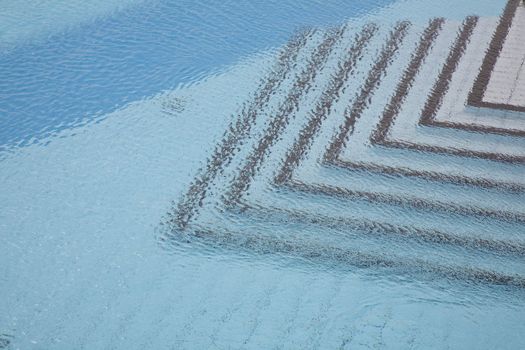 Detail of a swimming pool a windy day - Dalmatia, Croatia.