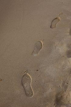 Human trace of a foot on sand