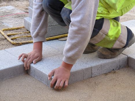 Paver on job in a mall.