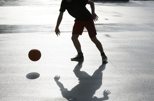 Street basketball just after the rain.