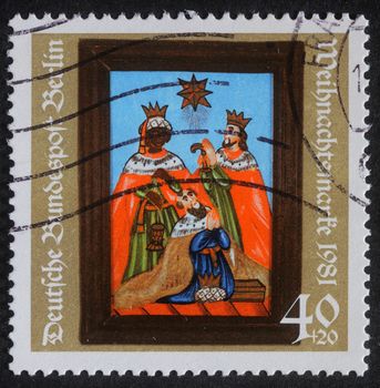 GERMANY - CIRCA 1981: A greeting Christmas stamp printed in the Germany shows birth of Jesus Christ, adoration of the Magi