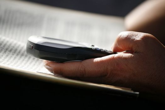 Senior writing a text message on her mobile phone.