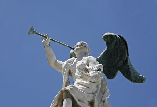 Venetian marble angel with bronze wings and trombone.
