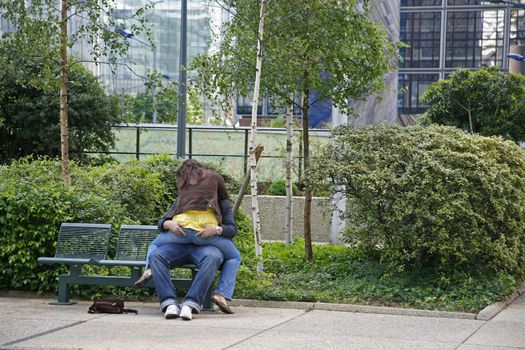 A young couple at springtime in La Defense - Paris