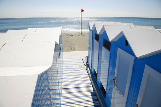 Nice blue beach huts at the Italian Riviera.