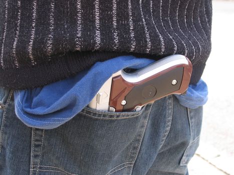 Teenager with plastic gun.