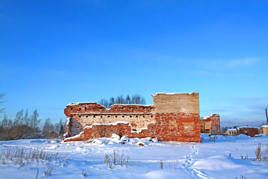 destroyed wall of the old brick building