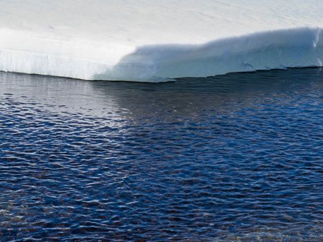Climate change concept: Edge of thawing arctic sea-ice.